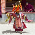 Buddhist lamas dressed in mystical mask dancing Tsam mystery dance in time of Yuru Kabgyat Buddhist festival at Lamayuru Gompa, La Royalty Free Stock Photo