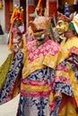 Buddhist lamas dressed in mystical mask dancing Tsam mystery dance in time of Yuru Kabgyat Buddhist festival at Lamayuru Gompa, La Royalty Free Stock Photo