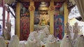 Buddhist are make offerings garlands of jasmine with the Luang Por Tan Jai buddha at Wat Phra That Doi Kham temple, Chiang Mai