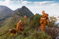 Buddhist master monk meditating in mountains