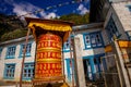 Buddhist monastery prayer wheel in Lukla village, Nepal