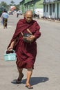 Buddhist monk with begging bowl Royalty Free Stock Photo