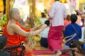 Buddhist monk blessing woman Royalty Free Stock Photo