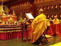 Buddhist monk during a ceremony at the Buddha`s Tooth Relic Temple in Singapore Royalty Free Stock Photo