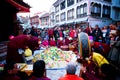 Buddhist monk distribute food, Nepal