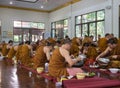 The buddhist monk have breakfast given by people who want to make great merit