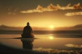 Buddhist monk meditating on calm lake at morning sunrise