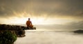 Buddhist monk in meditation at beautiful sunset or sunrise background Royalty Free Stock Photo