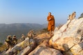 Buddhist monk photographs family of langur