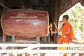 Buddhist Monk playing big drum at Champasak on Laos Royalty Free Stock Photo