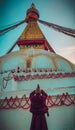 A Buddhist monk praying in the bouddhanath stupa