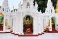 Buddhist monk praying at Shwedagon Pagoda 1 of 5 sacred places the sacred golden pagoda that symbolize the spiritual