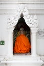 A Buddhist monk prays at Shwedagon Pagoda, Yangon, Myanmar