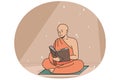 Buddhist monk reads ancient book sitting on rug. Royalty Free Stock Photo