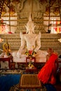 A Buddhist monk sits in his temple in Sukhothai, Thailand