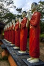 Buddhist monk statues at the Sigiriya Temple in Sri Lanka. Royalty Free Stock Photo