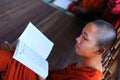 Buddhist monk studying Pali in a monastery