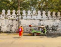 Buddhist monk walking to the temple in Ayutthaya Bangkok, Thailand Royalty Free Stock Photo