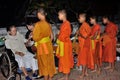 Buddhist Monks alms giving Royalty Free Stock Photo