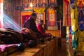 Buddhist monks ceremony prayers Tengboche monastery.