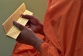 Buddhist monks chant during the ordain into monkhood