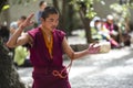 Buddhist monks` debating practice Ã¯Â¼Åthis monk is clapping when he asking , Sera monastery , Lhasa , Tibet