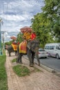 Buddhist monks on an elephant