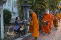 Buddhist monks getting alms