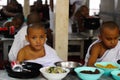 Buddhist monks having lunch