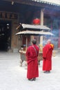 Praying Buddhist monks in the Hualin temple, China Royalty Free Stock Photo