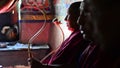 Buddhist monks and lamas praying