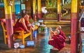 Buddhist monks in old monastery on Inle Lake, Myanmar