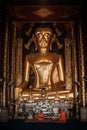 Buddhist monks at prayer in Buddhist temple, Northern Thailand