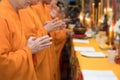 Buddhist monks praying hands Royalty Free Stock Photo