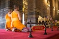 Buddhist monks praying in temple
