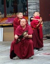 Buddhist monks preparing for the annual holiday presentation at the Dazhao Monastery