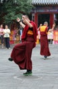 Buddhist monks rehearsing ritual dance for annual holiday presentation at Dazhao Monastery