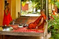 Buddhist monks of a riverside temple in Kampot, Cambodia