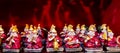 Buddhist monks souvenir on a red background