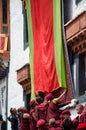 Buddhist Monks unveil the Thangka- A Tibetan Buddhist painting of Lord Padmashambhava