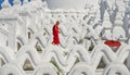 A Buddhist novice monk at white temple Royalty Free Stock Photo