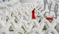 A Buddhist novice monk at white temple Royalty Free Stock Photo