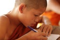 Buddhist novice studying in Luang Prabang, Laos Royalty Free Stock Photo