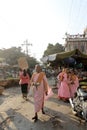 Buddhist nuns collecting alms at Zegyo Market