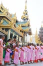Buddhist nuns getting alms in line