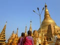Buddhist nuns visit the Shwedagon Pagoda in Yangon, Myanmar Burma