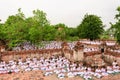 Buddhist peoples meditating against ancient