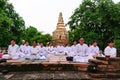 Buddhist peoples meditating against ancient