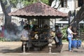 Buddhist pilgrims light oil lamps within the Temple of the Sacred Tooth Relic complex in Kandy in Sri Lanka.