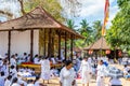 Buddhist pilgrims in the pavilions hall of shrine of Sri Dalada Maligawa or the Temple of the Sacred Tooth Relic, in Kandy, Sri
